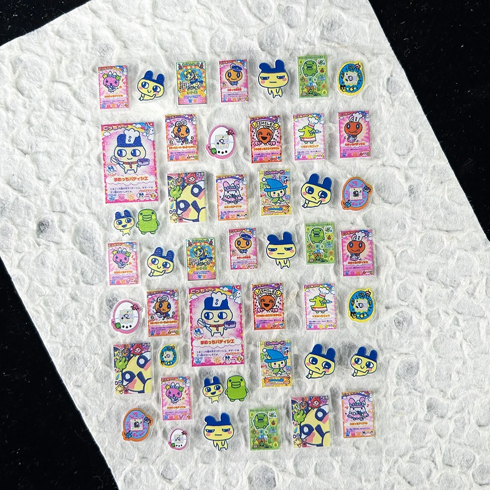 かわいいゲーム進化電子ペットステッカーネイルアートかわいい動 - Nail Tech Accessories のレビューと価格