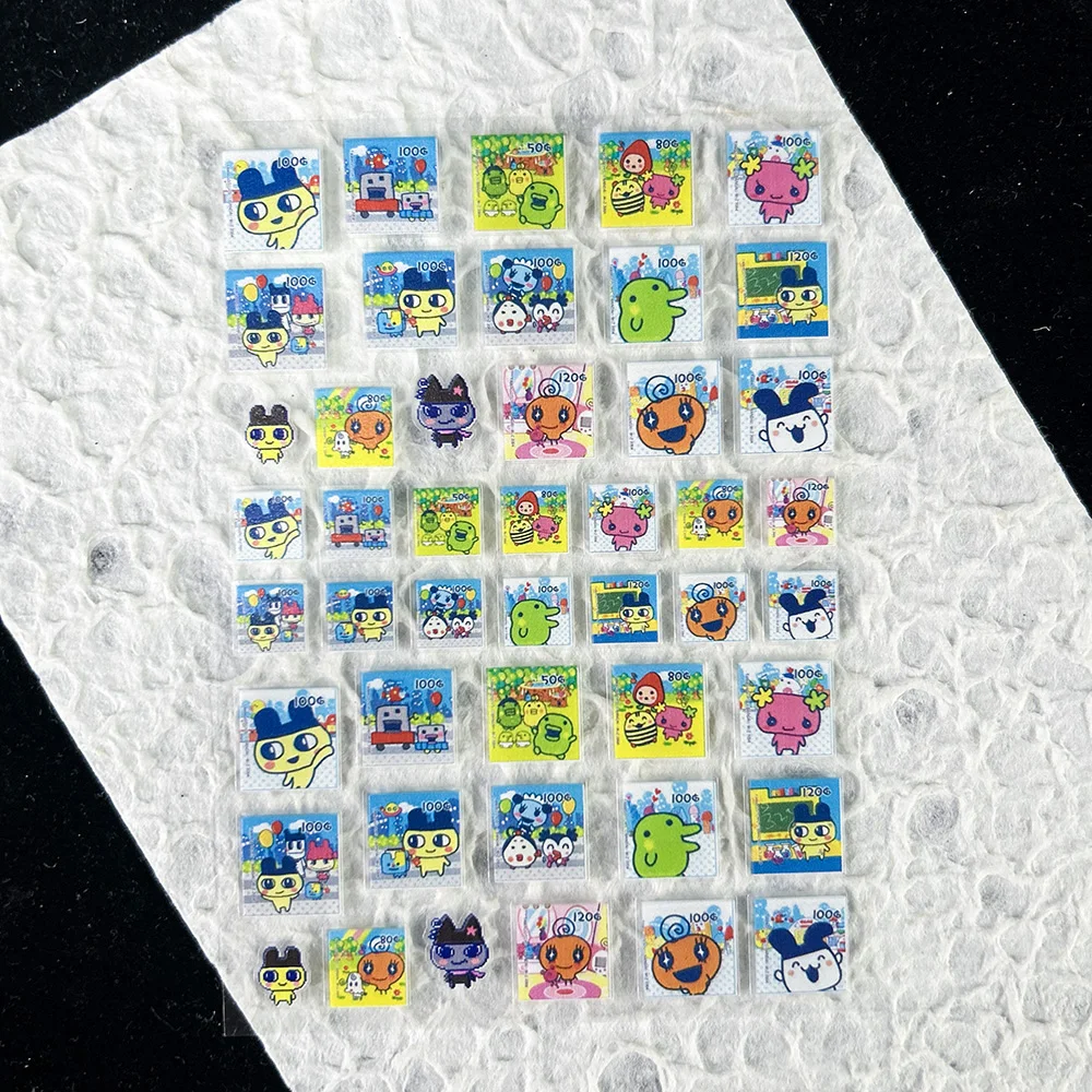 かわいいゲーム進化電子ペットステッカーネイルアートかわいい動 - Nail Tech Accessories のレビューと価格